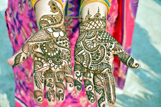 Henna tattoos on 2 hands