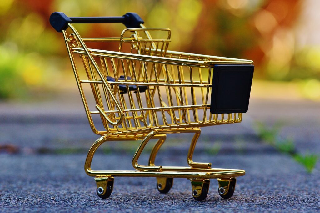 Anthropology Club. image of a gold shopping cart